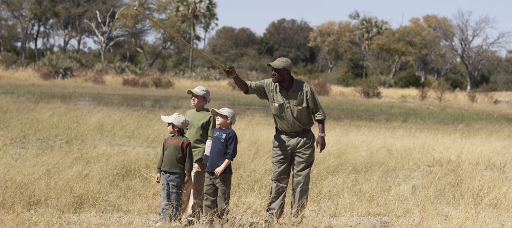 Kids on a safari walk at Seba Camp, Okavango Delta, Botswana (Wilderness Safaris) - Image 9