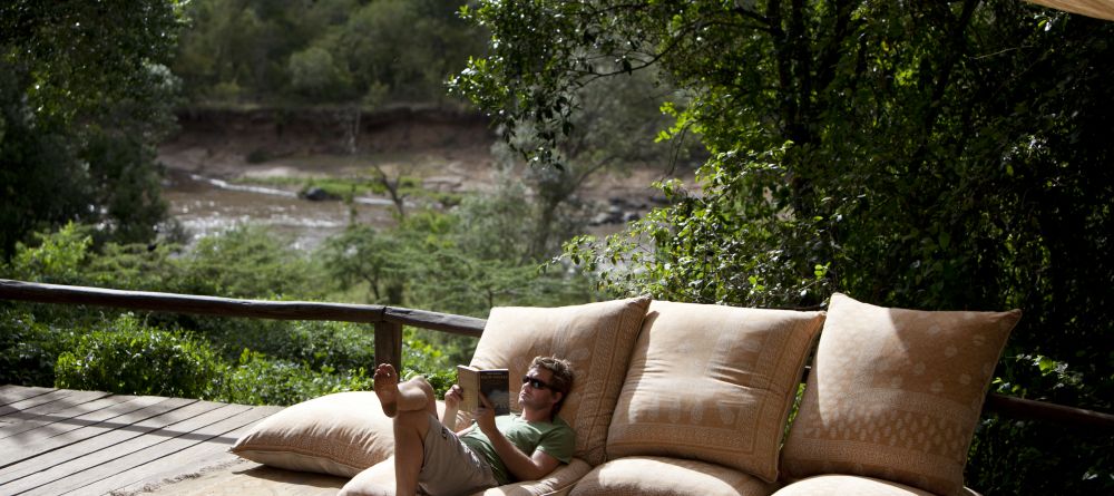 Patio reading and relaxation at Serian Camp, Masai Mara National Reserve, Kenya - Image 12