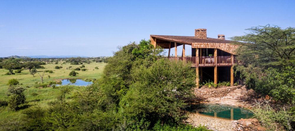 Whole exterior of lodge and pool at Faru Faru River Lodge, Grumeti Private Reserve, Tanzania - Image 7