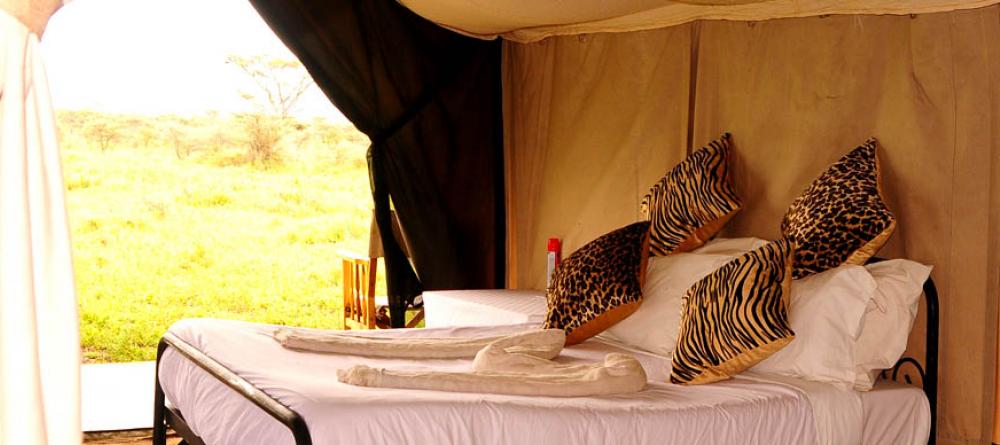 The tents offer comfort with beautiful views of the plains at Serengeti Savannah Camps, Serengeti National Park, Tanzania - Image 8