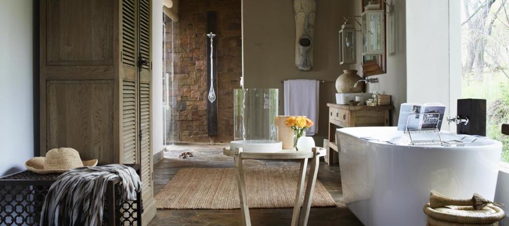 Luxurious bathrooms blend function and elegance at Singita Serengeti House, Serengeti Grumeti Reserves, Tanzania - Image 2