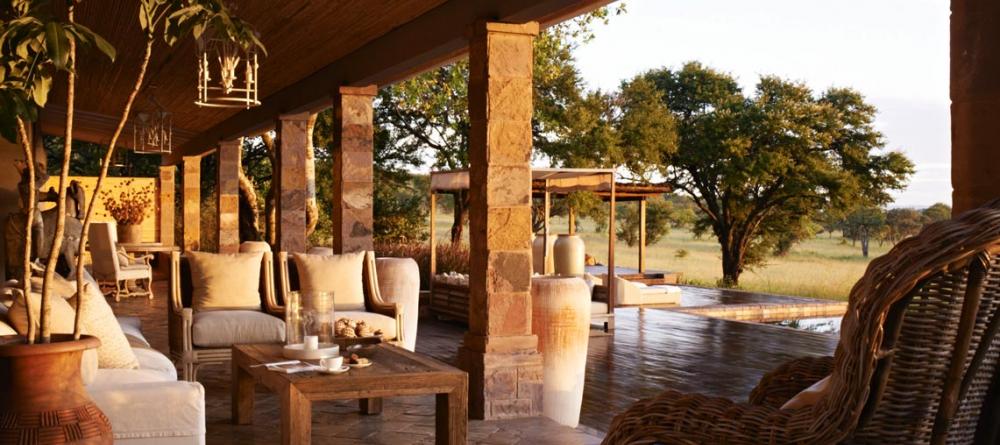Watch the sunset over the savannah at Singita Serengeti House, Serengeti Grumeti Reserves, Tanzania - Image 5