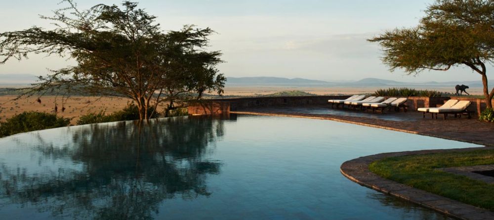 Relax by the pool and enjoy the stunning vistas at Singita Sasakwa Lodge, Grumeti Reserves, Tanzania - Image 20