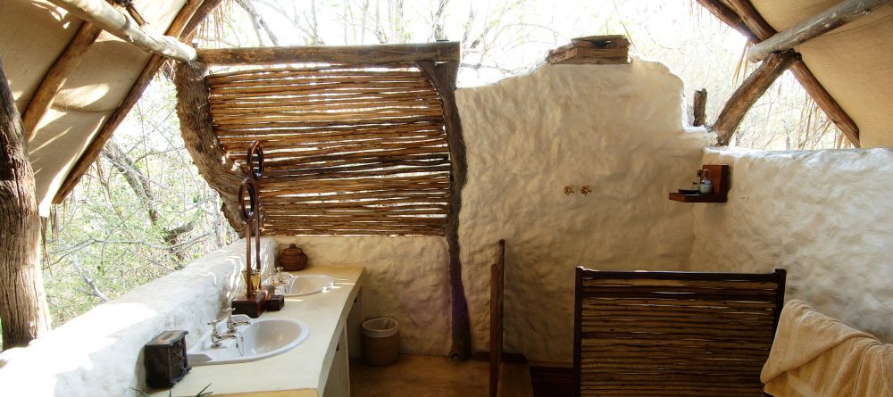 Standard bathrom- Sand Rivers Selous, Selous National Park, Tanzania Â© Nomad Tanzania - Image 3