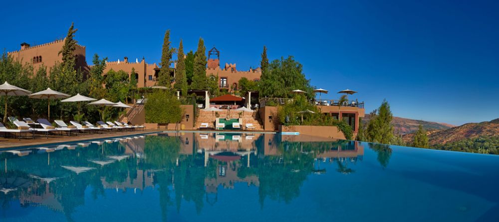 Stunning view from the main outdoor pool at Kasbah Tamadot, Atlas Mountains, Morocco - Image 8