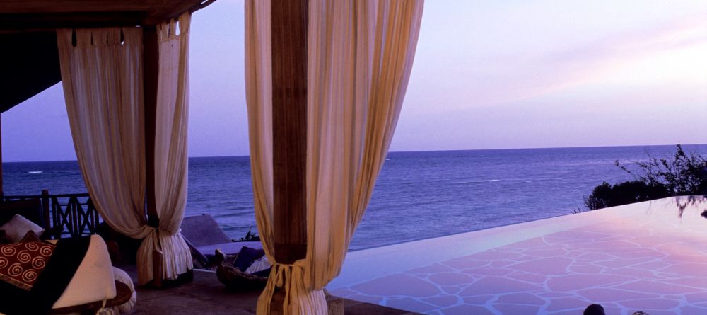 Watch the sunset from a private veranda at Alfajiri Villas, Diani Beach, Tanzania - Image 1