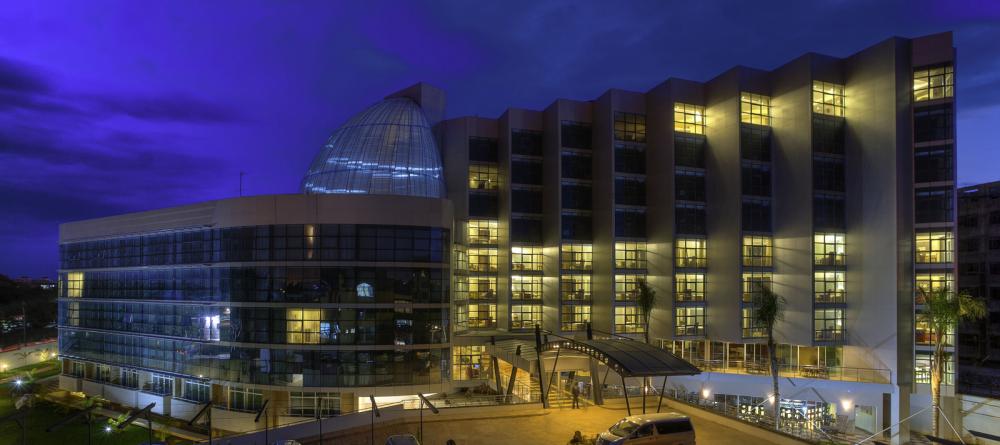 The exterior illuminated at night at The Boma Nairobi, Nairobi, Kenya - Image 9