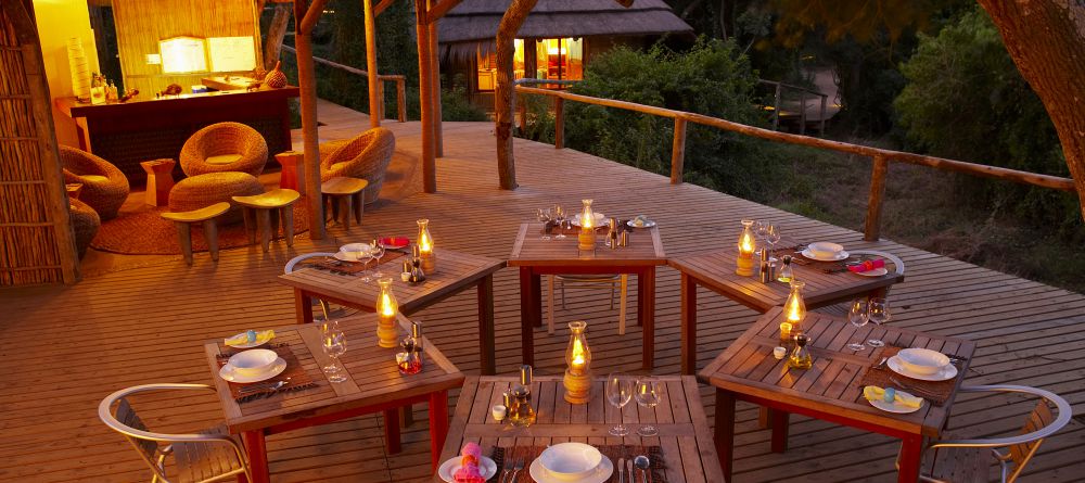 Thonga Beach Lodge - Bar in the Evening - Image 7