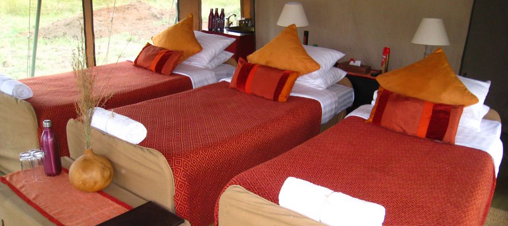 Tent interior at Ubuntu Camp, Serengeti National Park, Tanzania - Image 7