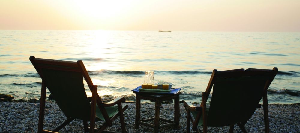 Watching the sunset from beach chairs at Gombe Forest Lodge, Gombe National Park, Tanzania - Image 3