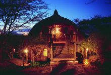 Room exterior by night at Serena Serengeti Safari Lodge, Serengeti National Park, Tanzania