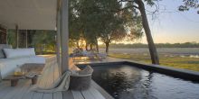 Private plunge pools are shaded by ancient trees at Chinzombo, South Luangwa National Park, Zambia