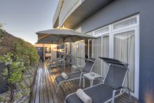 The veranda with sun loungers at O on Kloof, Cape Town, South Africa