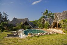 Pool and exterior of buildings at Alfajiri Villas, Diani Beach, Tanzania