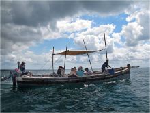 Boats take guests out to on diving and snorkeling excursions at Lua Cheia Beach Camp, Mafia Island, Tanzania