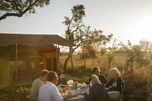 Dining outdoors at Nomad Serengeti Safari Camp- Ndutu, Serengeti National Park, Tanzania