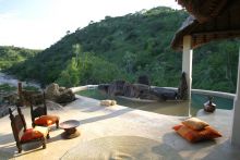 The private pool, with the natural surroundings incorporated into its design, allows for relaxation at the Eagle Cottage at Sabuk Lodge, Laikipia, Kenya