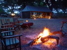 Fireside relaxation at Chada Katavi Camp, Katavi National Park, Tanzania Â© Nomad Tanzania