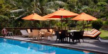 The pool and sun loungers at Hotel L Archipel, Praslin, Seychelles