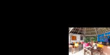 Enjoy a meal in the colorful, open air dining area at Kasha Boutique Hotel, Zanzibar, Tanzania