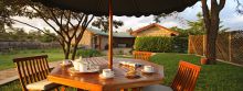 Dining in the courtyard at Hogmead, Nairobi, Kenya