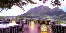 Dine in al fresco elegance with spectacular views of the valleys and mountains at Delaire Graff, Stellenbosch, South Africa