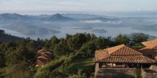 Setting with roof at Virunga Lodge, Volcanoes National Park, Uganda