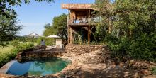 Exterior of the lodge at Faru Faru River Lodge, Grumeti Private Reserve, Tanzania